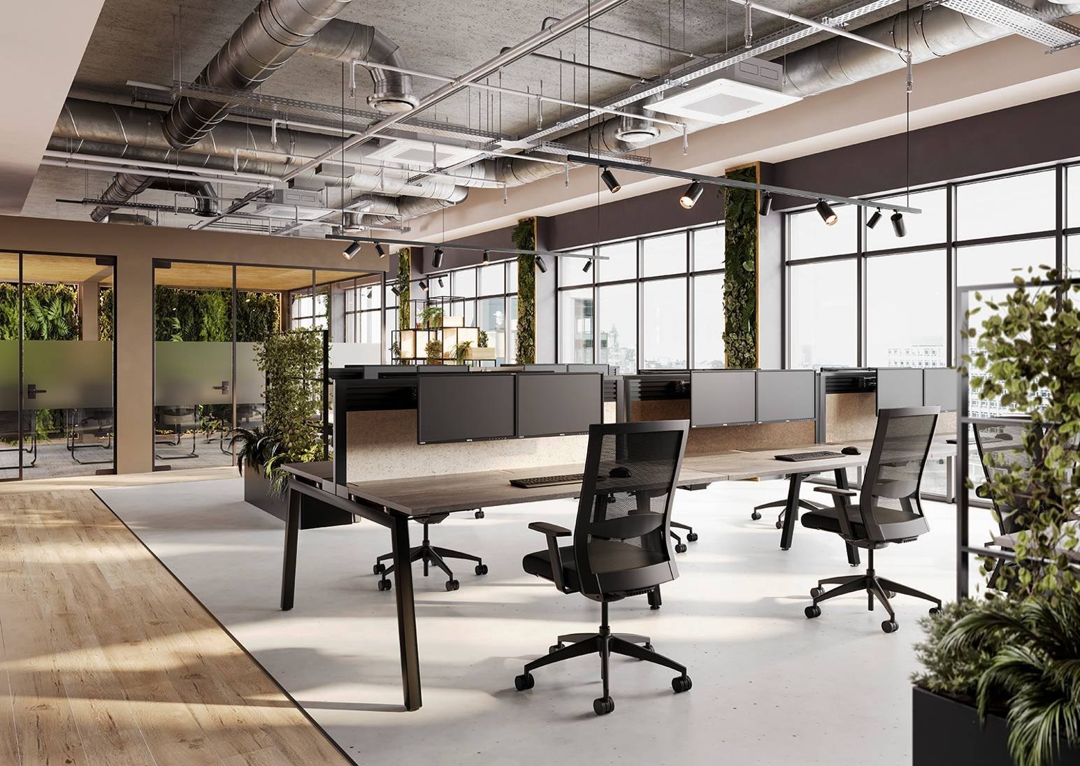 Open-plan office with bench desking, mesh task chairs, acoustic screens and living green walls